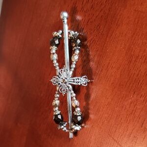 Medium, Lillarose cross with dark brown gems.